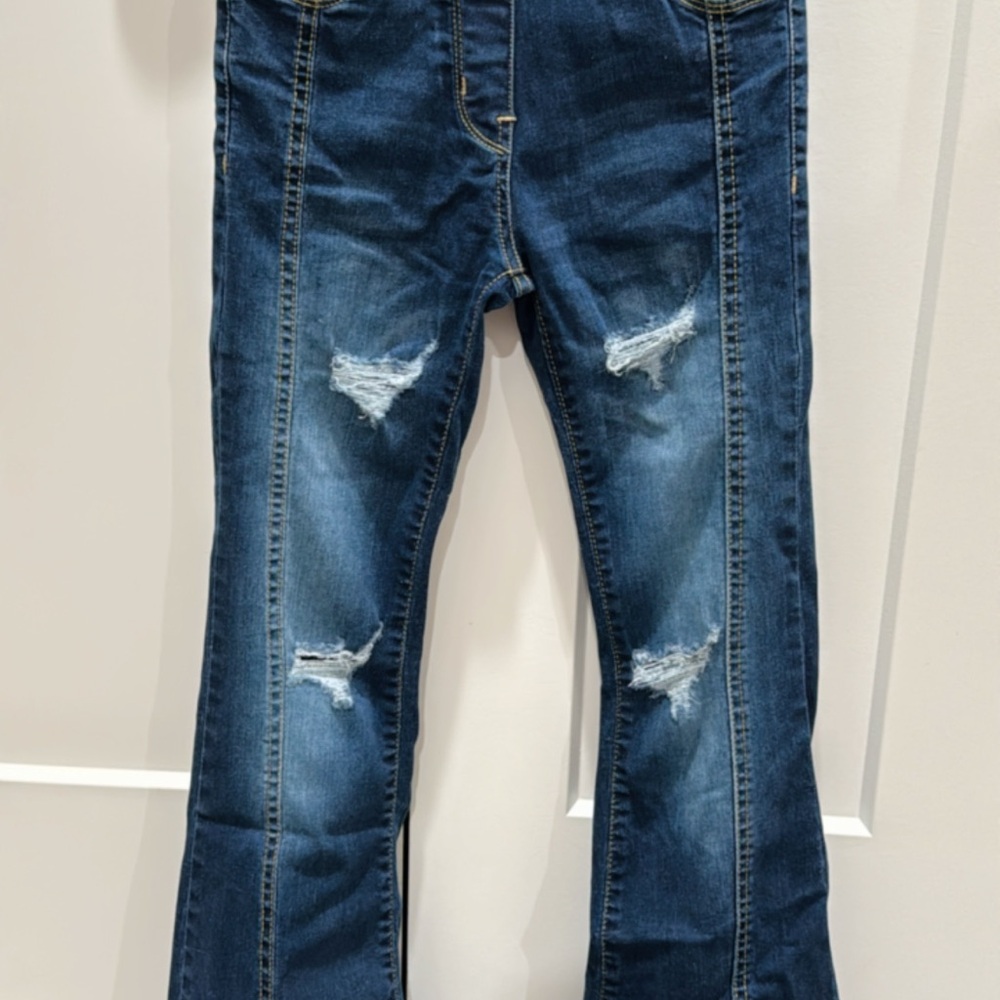 Distressed Blue Jeans